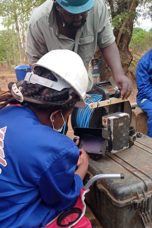 Members of the Kibbutz team performing down-the-hole camera surveys